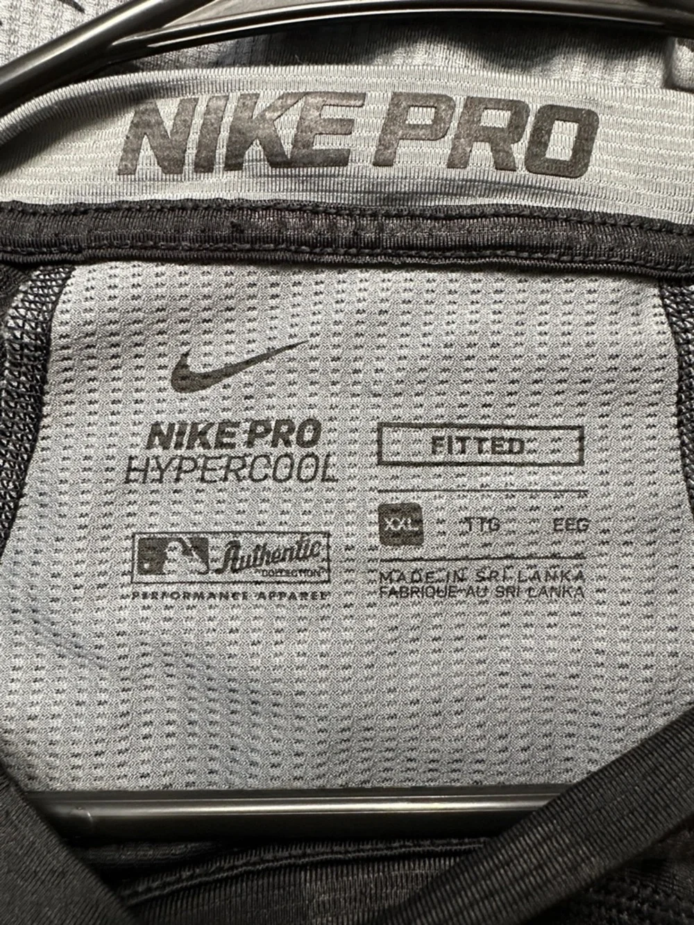 Nike Black Long-Sleeve Performance Tee with Subtle Geometric Print